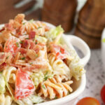 BLT pasta salad in white bowl