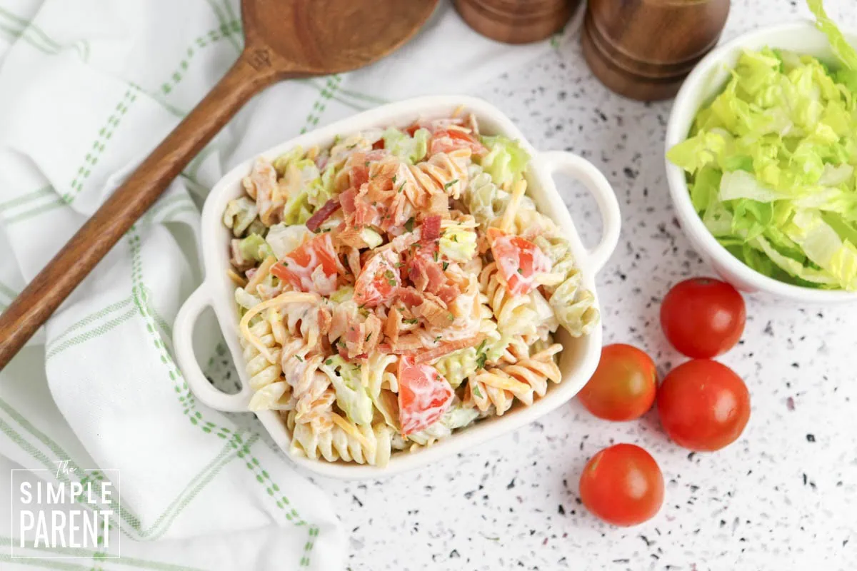 BLT salad with pasta in white bowl