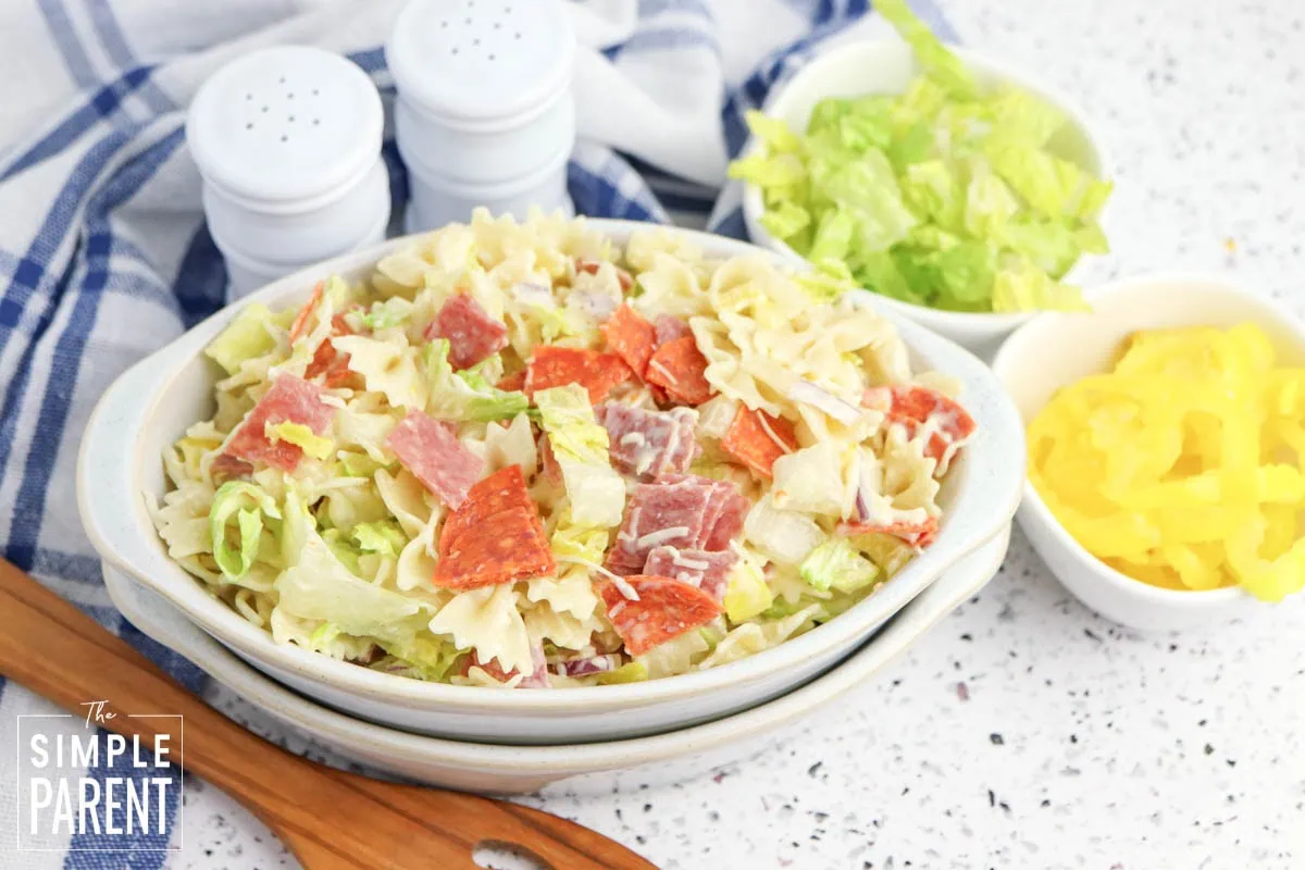 cold cut salad in white servind dish