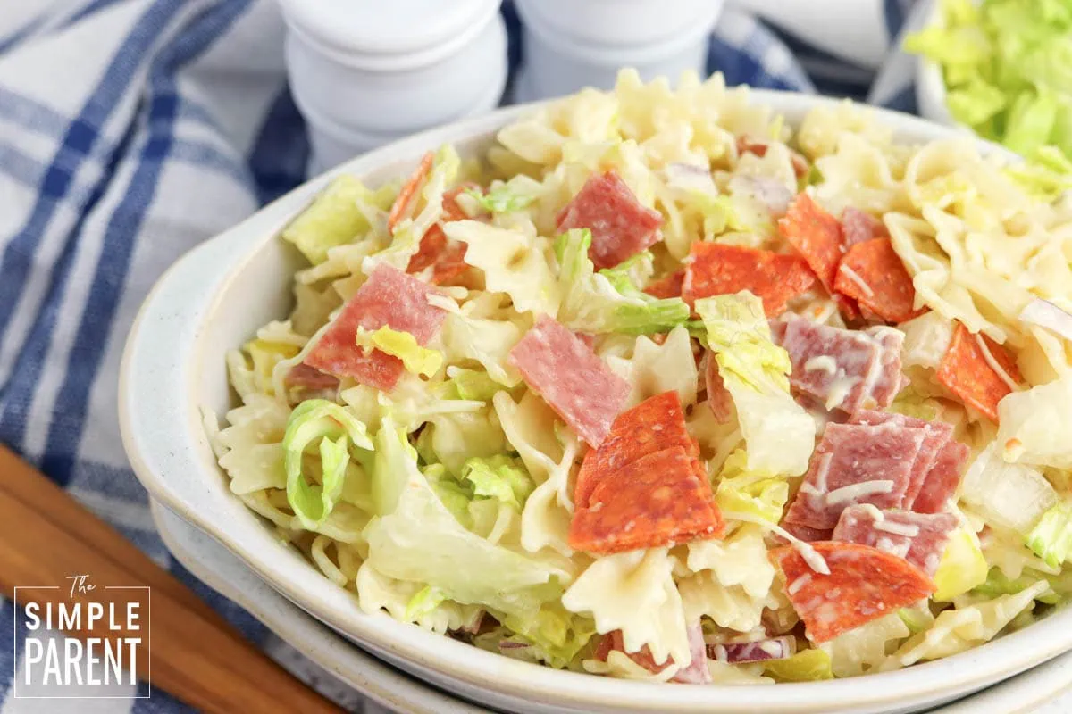 Italian grinder pasta salad in white serving dish