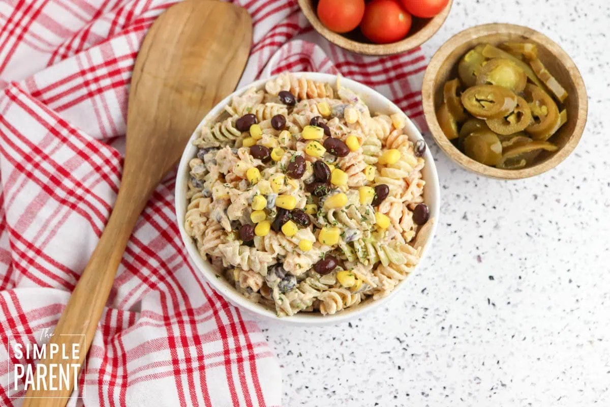 Mexican pasta salad with corn in a white bowl