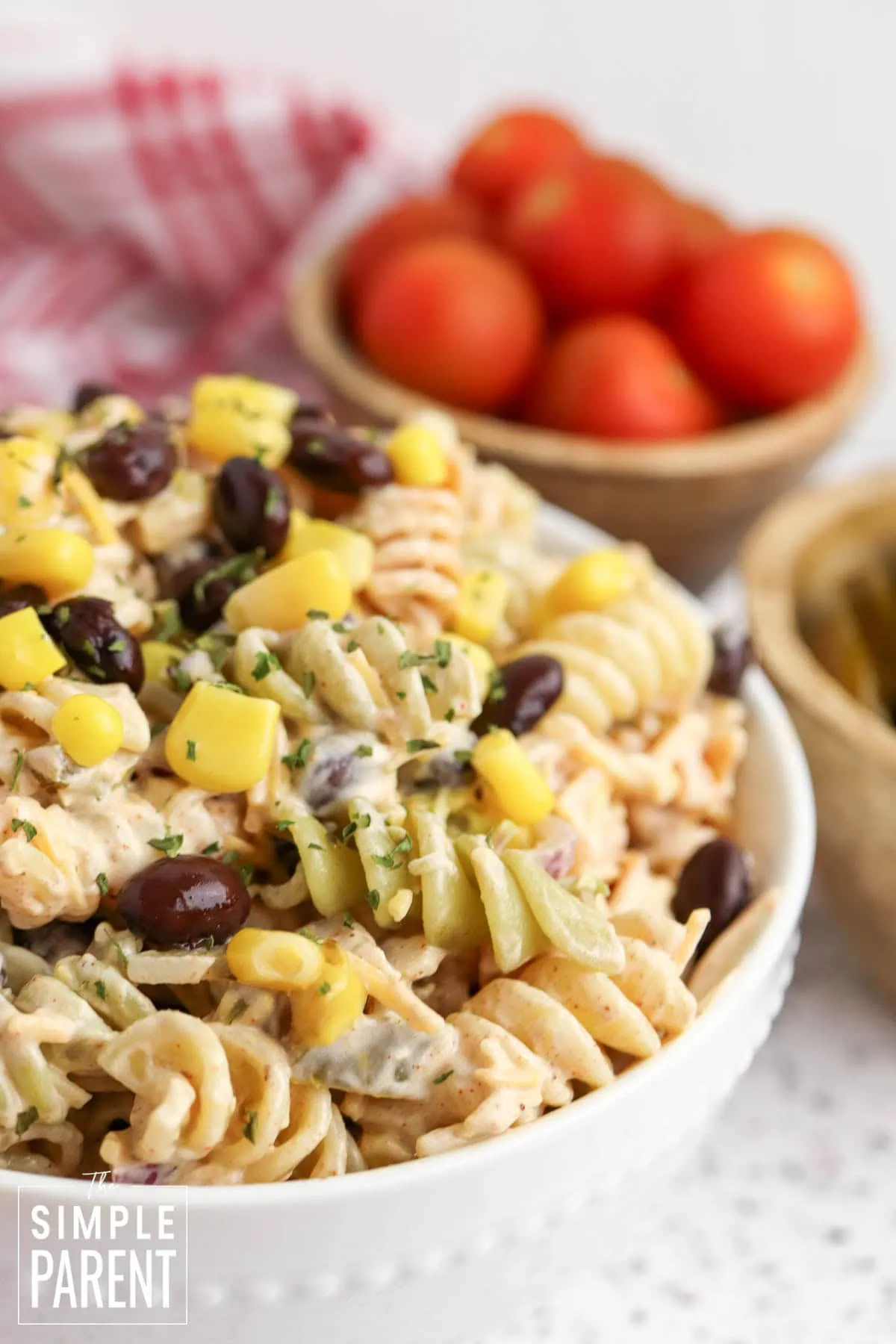 mexican street corn salad pasta in white bowl