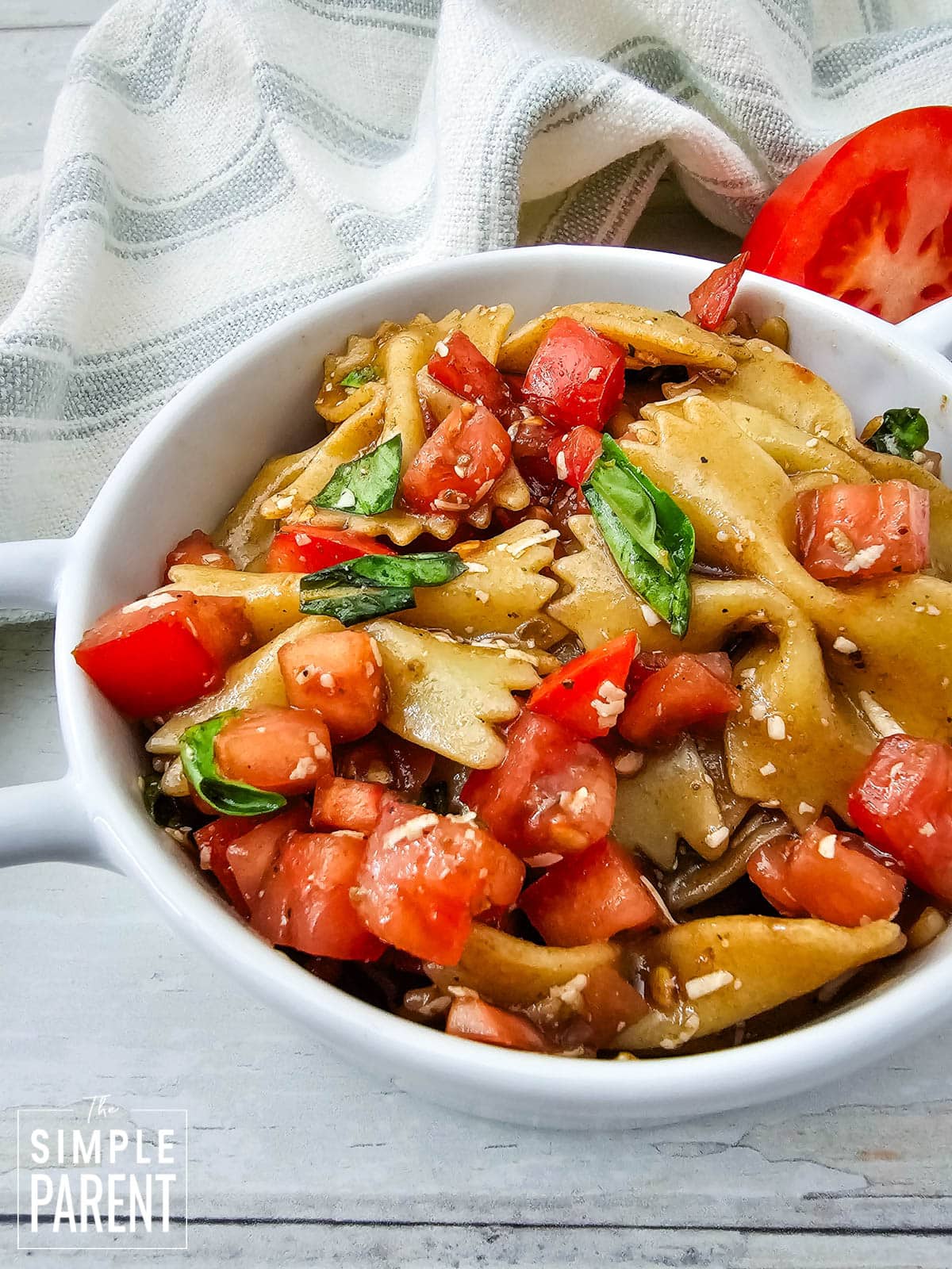 bruschetta pasta salad in white bowl