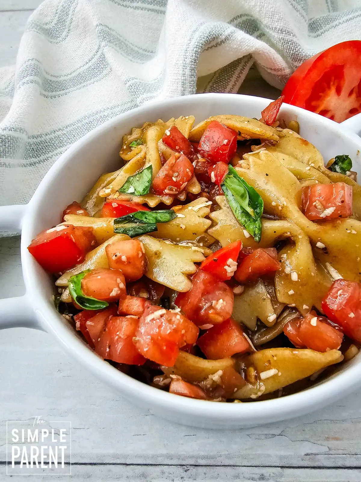 bruschetta pasta salad in white bowl
