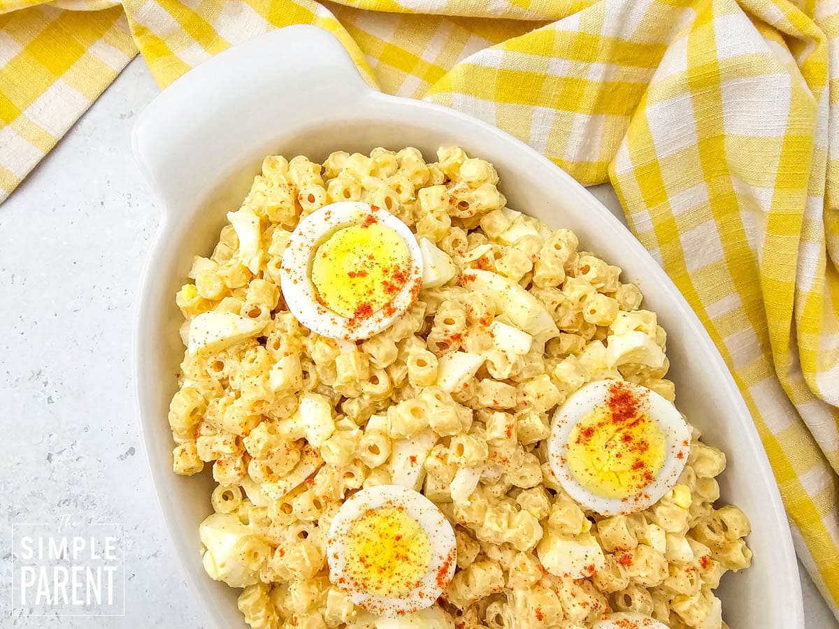 Deviled Egg Macaroni Salad in white serving dish