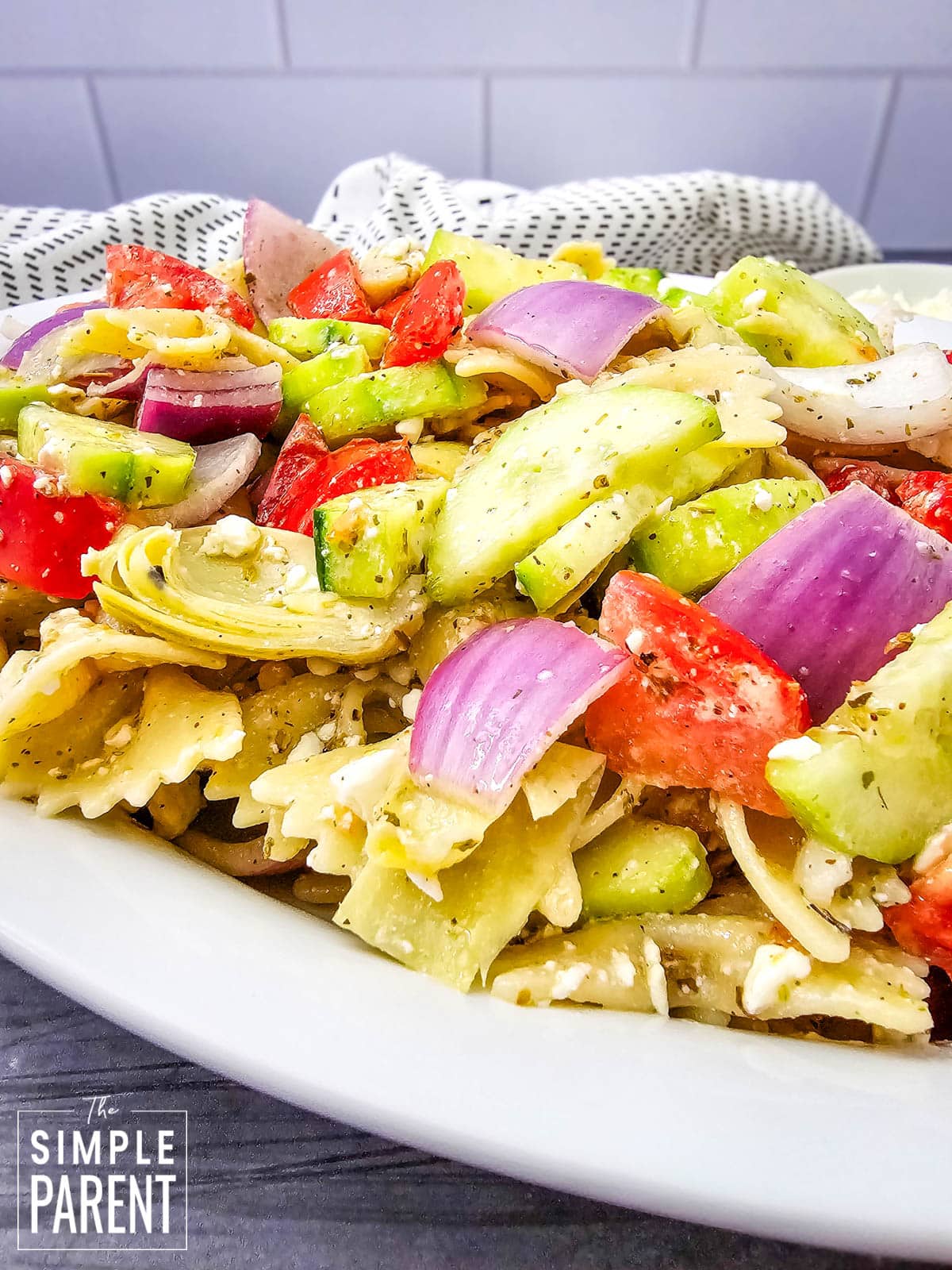 Italian pasta salad in white serving dish