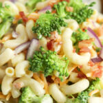 Broccoli pasta salad with bacon for potlucks and parties in white serving bowl