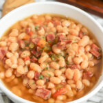 Crockpot Ham and Bean Soup in white bowl
