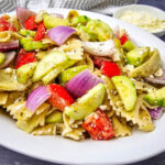 Greek pasta salad with feta in white serving bowl