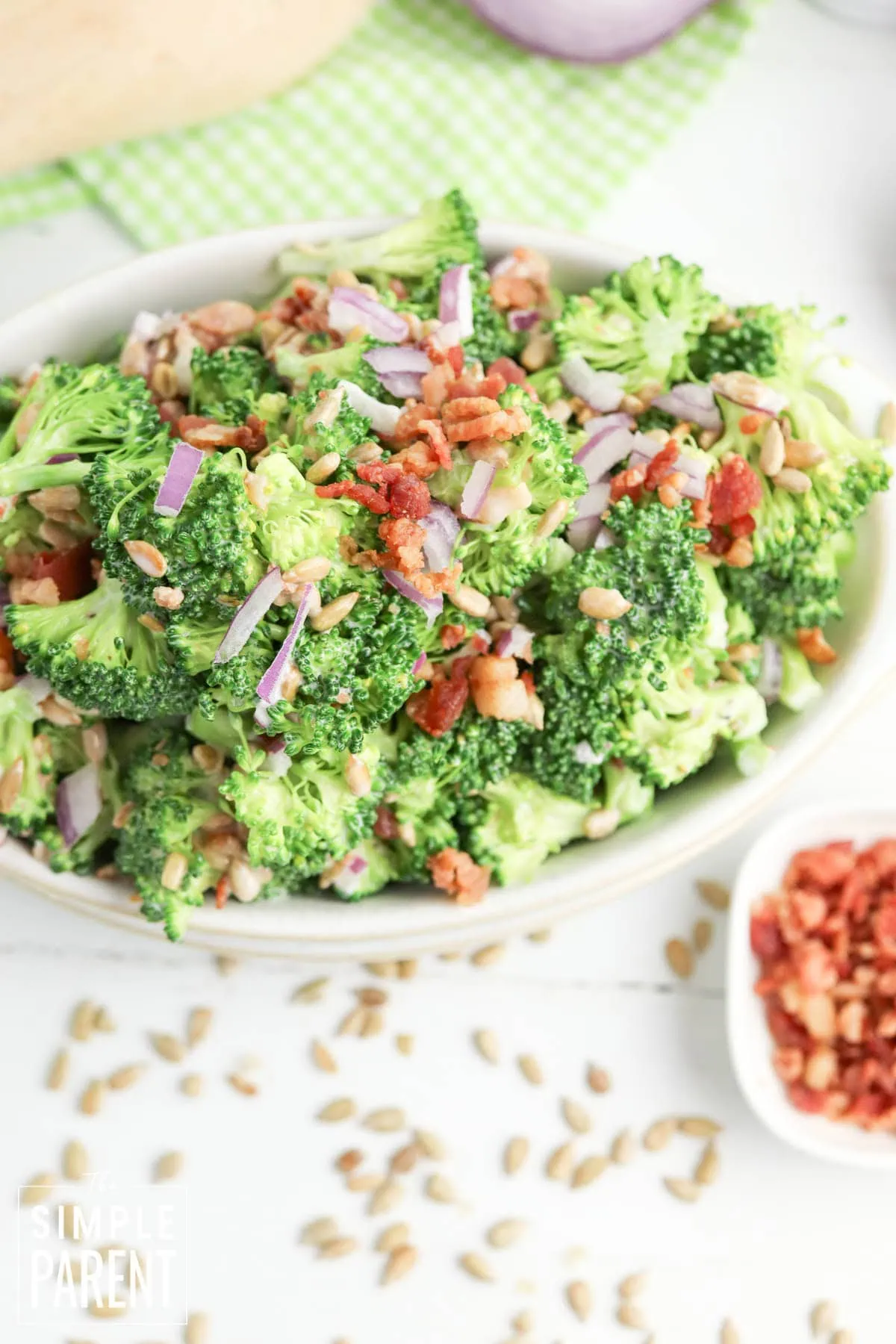 old fashioned broccoli salad in white bowl