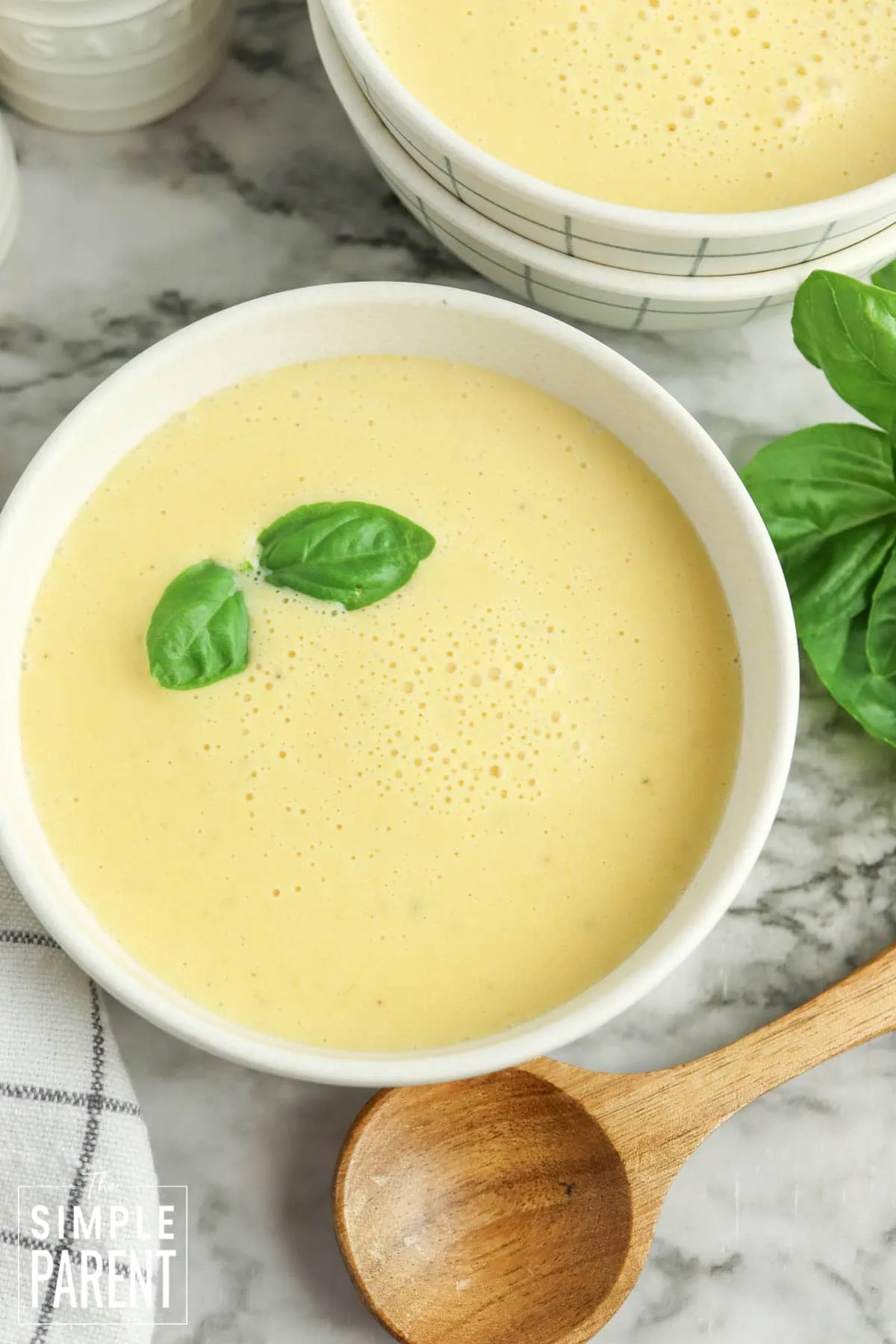 Crockpot Butternut Sqaush Soup in white bowl