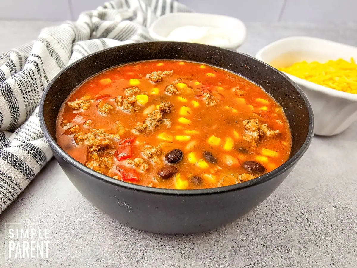 Easy 7 Can Taco Soup in black bowl